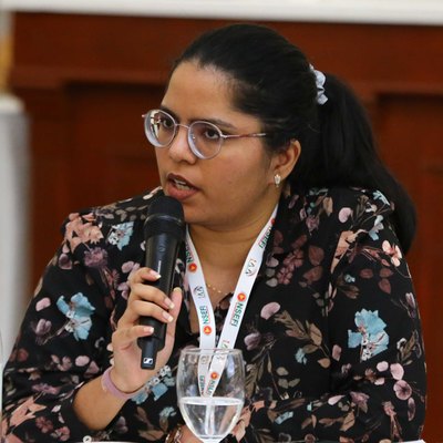 Nimeshee Singh speaking at a policy dialogue